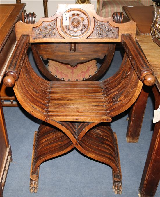 A Continental carved walnut Savonarola style chair, c.1900